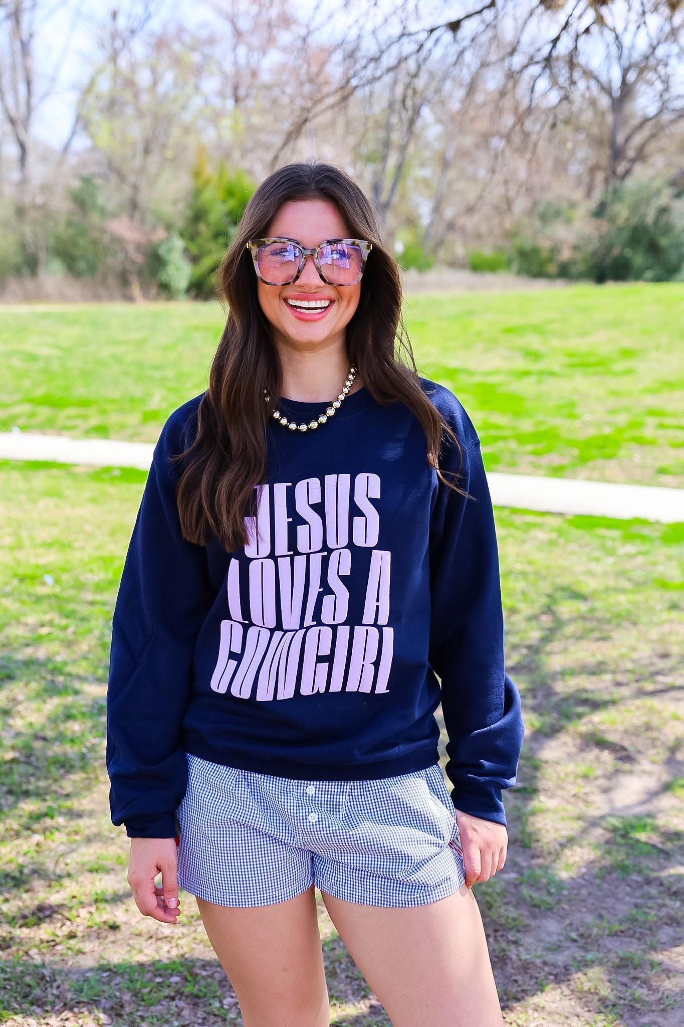 JESUS LOVES A COWGIRL TEE | CREWNECK