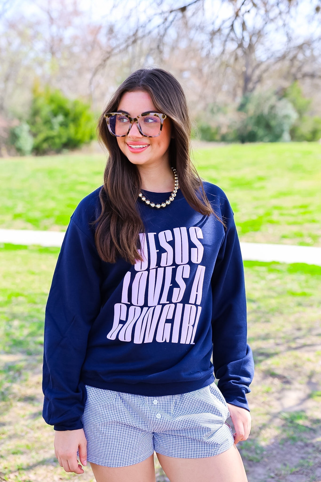 JESUS LOVES A COWGIRL TEE | CREWNECK