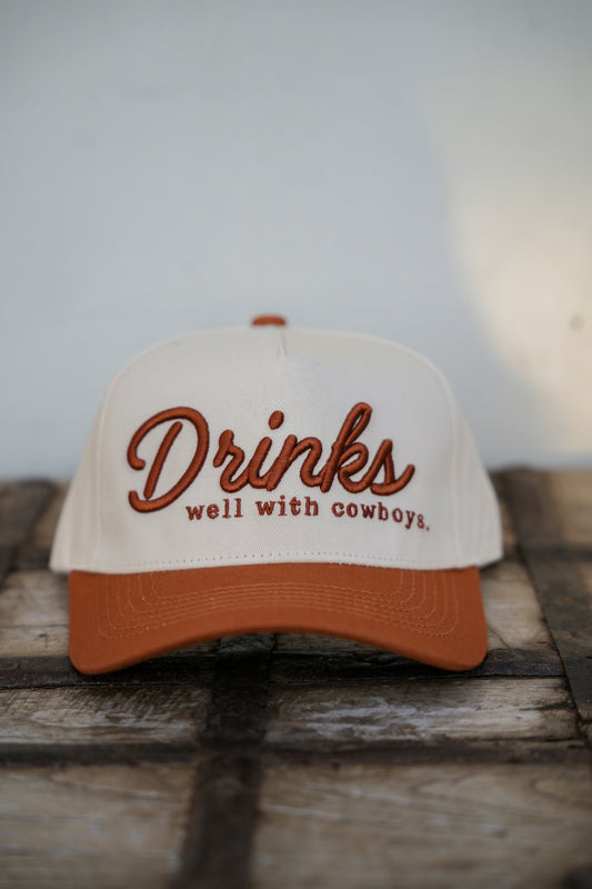 DRINKS WELL WITH COWBOYS CANVAS CAP