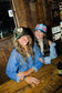 COWBOYS MAKE BETTER LOVERS TRUCKER HAT
