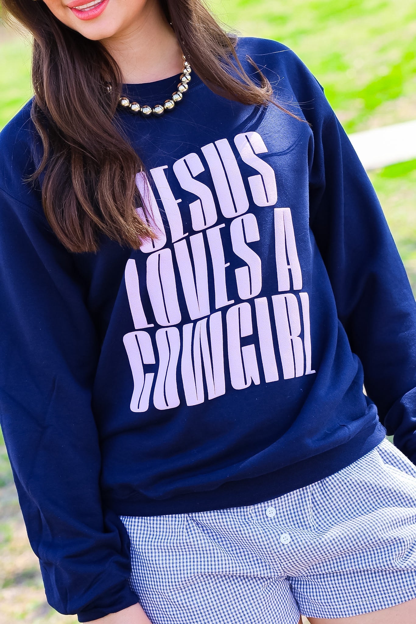 JESUS LOVES A COWGIRL TEE | CREWNECK