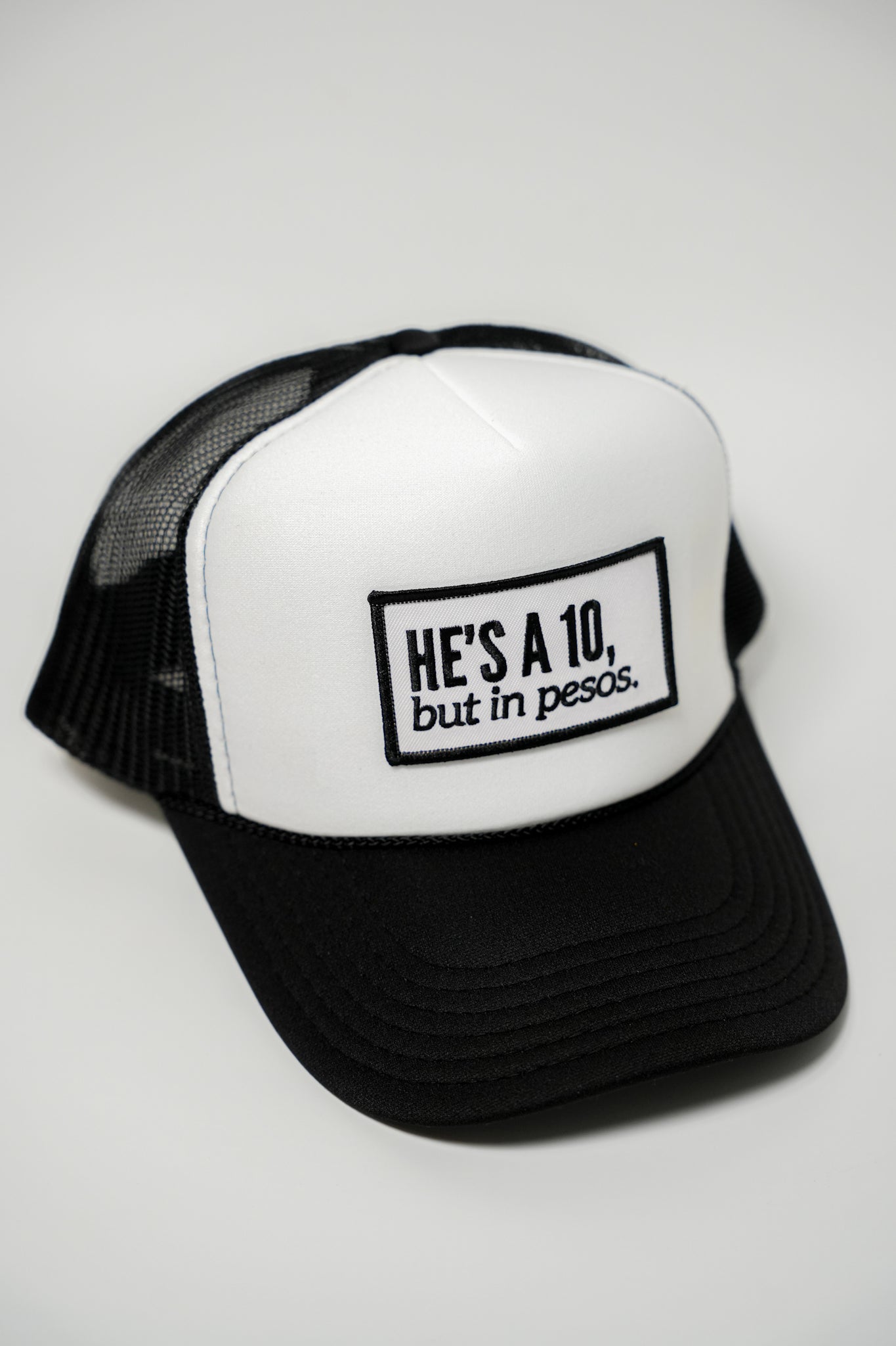 HE'S A 10, BUT IN PESOS TRUCKER HAT