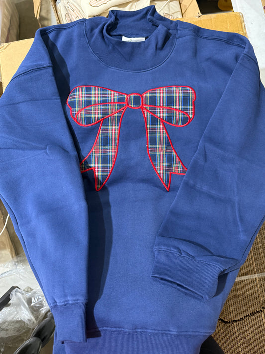 NUTCRACKER - BOW COWL NECK